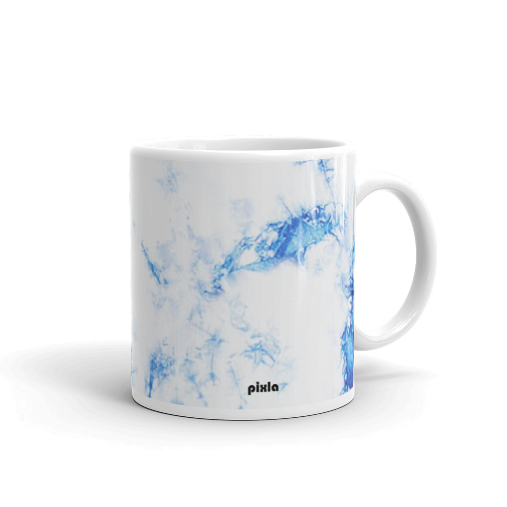 The perfect white and glossy white and blue tie dye mug that’s sturdy and comfortable with a vivid print that’ll withstand the microwave and dishwasher.