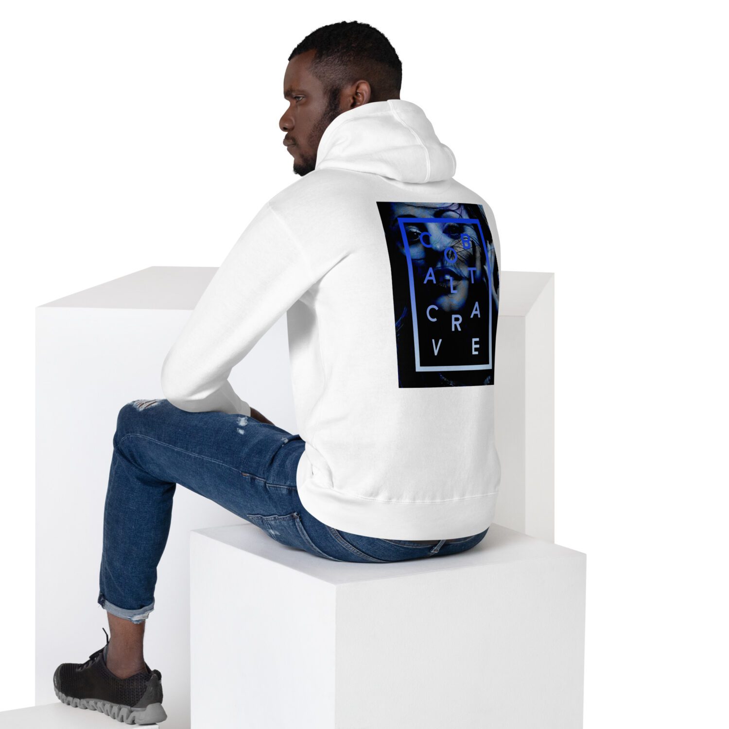 Cozy white unisex go-to premium hoodie in a slim fit to curl up in. Nice medium-weight fabric with a stunning cobalt blue print on the back and super soft fleece inside. Logo print on front chest and cool royal blue print on the upper back.